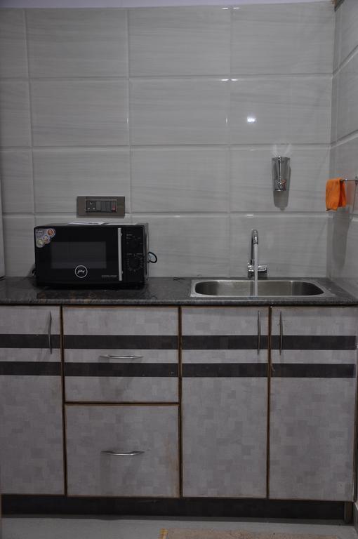 Hotel Av Comforts Бангалор Стая снимка